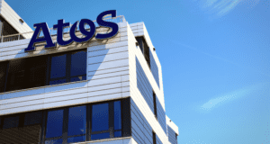 Atos issues profit warning, shares slide by as much as 15%