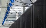 A row of servers in a large data center.