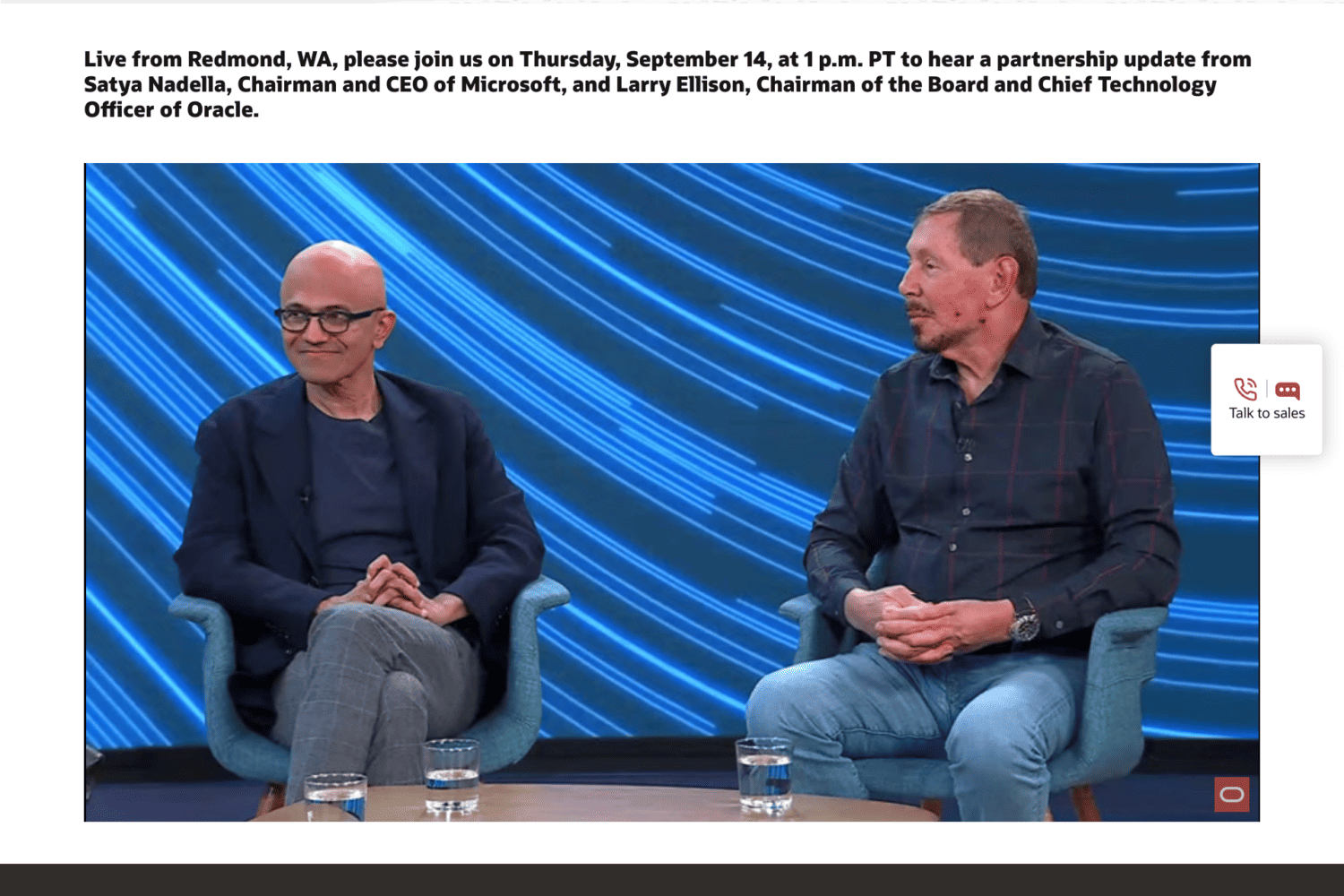 screencapture-oracle-cloud-azure-event-2023-09-14-22_11_55 Two men sitting in chairs on a screen.